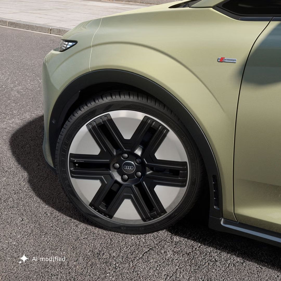 Bližnji posnetek 20-palčnih platišč modela Audi A2 e-tron s 6-krakim površinskim aero designom.