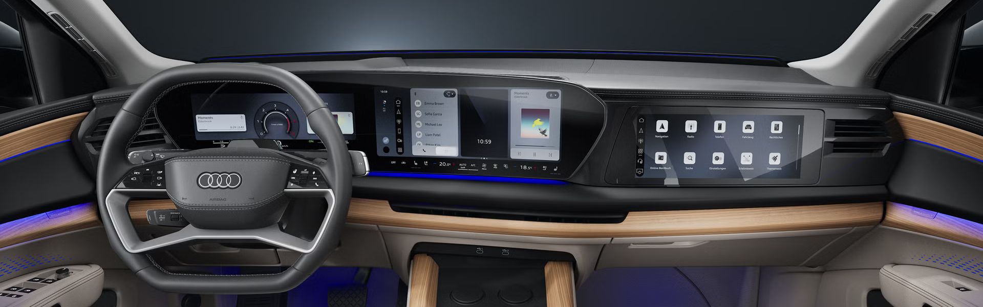 Pogled na voznikov in sovoznikov prostor s športnimi sedeži in digitalnima zaslonoma v Audiju Q7 SUV.