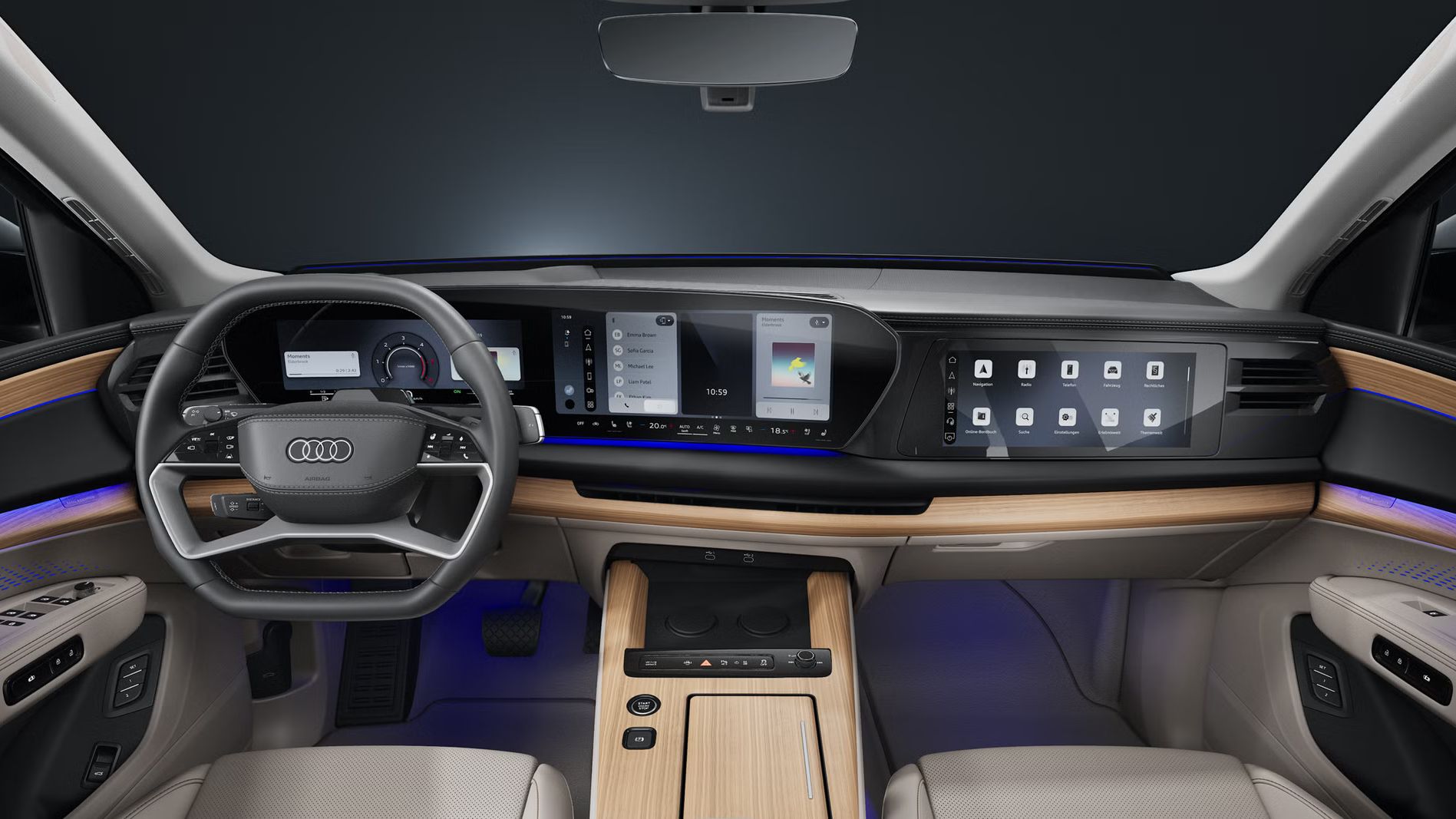 Pogled na voznikov in sovoznikov prostor s športnimi sedeži in digitalnima zaslonoma v Audiju Q7 SUV.