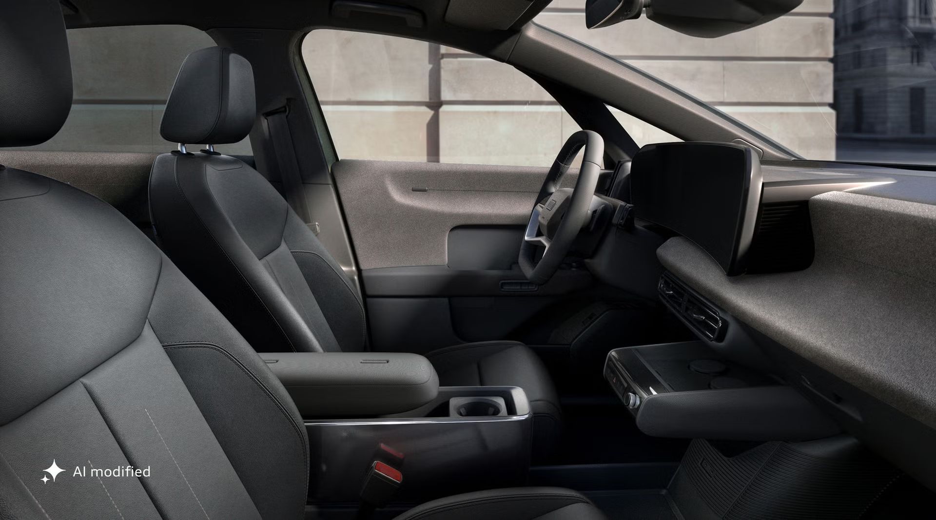 Pogled z voznikove strani na armaturno ploščo modela Audi A2 e-tron s poudarkom na sprednjih sedežih, volanu in digitalnih zaslonih.